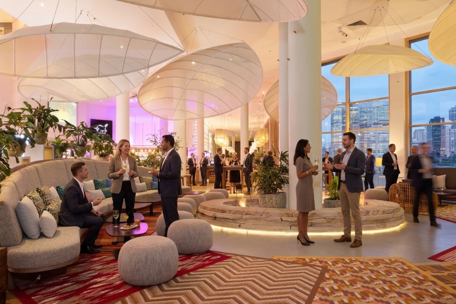 Guests networking at a cocktail event in a modern lounge at The Ternary Sydney